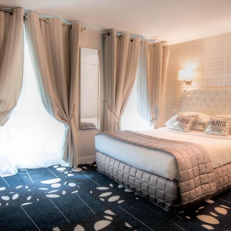 Hotel Ile De France Opera Párizs Szoba fotó